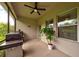 Relaxing screened-in patio with a grill for outdoor cooking and entertaining at 3142 Dark Sky Dr, Harmony, FL 34773