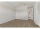 Light and airy bedroom showcases wood floors, neutral walls, and a double door closet at 3326 Sassaquin Ct, Orlando, FL 32818
