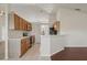 Spacious kitchen features stainless appliances, white countertops, and wood cabinets at 3326 Sassaquin Ct, Orlando, FL 32818