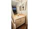 Bathroom featuring a large mirror, a vanity, and hanging towels at 3379 S Kirkman Rd # 1027, Orlando, FL 32811