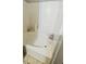 Bathroom view of a clean white bathtub with tile surround at 3379 S Kirkman Rd # 1027, Orlando, FL 32811