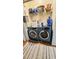Efficient laundry room with modern Samsung washer and dryer, plus overhead storage space at 3379 S Kirkman Rd # 1027, Orlando, FL 32811
