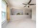 Bonus room with carpeted flooring and a vaulted ceiling at 3585 Ventura Club Cir, Orlando, FL 32822