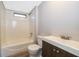 Bathroom with a tub and shower combo, toilet, and a modern vanity with a sink at 411 Racoon Trl, Geneva, FL 32732
