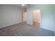 This bedroom features carpet and a walk-in closet at 461 Brunswick Dr, Davenport, FL 33837