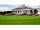 Gorgeous clubhouse with stately columns overlooks well-maintained grounds at 461 Brunswick Dr, Davenport, FL 33837