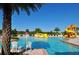 This community pool features slides and ample lounge chairs for residents at 461 Brunswick Dr, Davenport, FL 33837