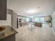 Spacious living room with access to backyard through sliding glass doors provides great natural light at 461 Brunswick Dr, Davenport, FL 33837