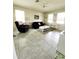 Comfortable living room with tile floors and neutral decor at 461 Brunswick Dr, Davenport, FL 33837