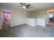 Open loft area with neutral carpet and an open view, offering versatility and style at 461 Brunswick Dr, Davenport, FL 33837