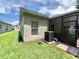 Exterior view of the backyard and screened-in patio at 500 Wellesly St, Oviedo, FL 32765