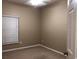 Neutral bedroom featuring carpet flooring, a window with blinds, and a ceiling fan at 500 Wellesly St, Oviedo, FL 32765