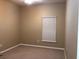 Neutral bedroom with carpet flooring, a window, and a ceiling fan at 500 Wellesly St, Oviedo, FL 32765
