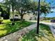 View of the home from street view with a well-manicured lawn at 500 Wellesly St, Oviedo, FL 32765