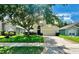 Charming single-story home with a well-manicured front lawn and attached two-car garage at 500 Wellesly St, Oviedo, FL 32765