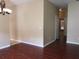Living room with shiny wood floors and a view to another room at 500 Wellesly St, Oviedo, FL 32765