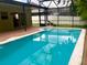 Private screened-in pool with brick patio area at 500 Wellesly St, Oviedo, FL 32765