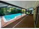 Screened-in pool and brick paved deck offer space for outdoor living and entertaining at 500 Wellesly St, Oviedo, FL 32765