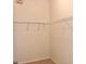 Spacious walk-in closet featuring wire shelving on all sides, perfect for clothing and accessory organization at 500 Wellesly St, Oviedo, FL 32765