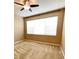 Bedroom with ceiling fan, and natural light streaming through the window at 506 Terrace Spring Dr, Orlando, FL 32828