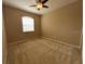 Bedroom with neutral carpet and ceiling fan at 506 Terrace Spring Dr, Orlando, FL 32828