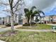 Attractive townhome exteriors with attached garages and landscaping at 506 Terrace Spring Dr, Orlando, FL 32828