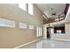 Bright living room boasting an open floor plan and soaring high ceilings at 506 Terrace Spring Dr, Orlando, FL 32828