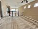 Bright loft area with neutral carpet and view of multiple windows at 506 Terrace Spring Dr, Orlando, FL 32828