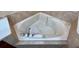 Close-up of a corner bathtub at 506 Terrace Spring Dr, Orlando, FL 32828