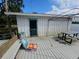 Lakeside dock with seating and space for waterside relaxation and recreation at 606 Butler St, Windermere, FL 34786
