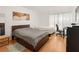 Shared bedroom with two beds, a desk, and a view of the outside at 6453 Alcalde Ct # 110, Orlando, FL 32835