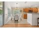 Cozy dining area with natural light, seamlessly connected to kitchen with appliances at 6453 Alcalde Ct # 110, Orlando, FL 32835
