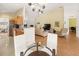 Open-concept living room seamlessly connected to the kitchen, creating a spacious and inviting atmosphere at 6453 Alcalde Ct # 110, Orlando, FL 32835