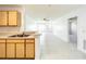 Open layout seamlessly connects kitchen and living room for easy entertaining at 6524 Swissco Dr # 1012, Orlando, FL 32822