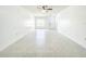 Bright, open living area features light walls, updated floors, and large window at 6524 Swissco Dr # 1012, Orlando, FL 32822