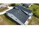 Aerial view showcasing the home's new roof, backyard, and green space at 9122 Trevarthon Rd, Orlando, FL 32817