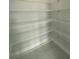 Walk-in pantry featuring white wire shelving for optimal storage and organization in this home at 9122 Trevarthon Rd, Orlando, FL 32817