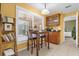 A charming dining area is brightly lit and features a coffee bar at 9275 Lake Sharp Ct, Orlando, FL 32817