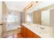 Bathroom featuring double vanity and walk-in shower at 1017 Gould Pl, Oviedo, FL 32765