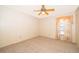 Bedroom with carpet floors, ceiling fan, and a window at 1017 Gould Pl, Oviedo, FL 32765