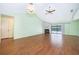 Bright living room with a cozy fireplace and sliding glass doors leading to the pool area at 1017 Gould Pl, Oviedo, FL 32765