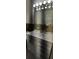 Bathroom featuring a vanity with storage and an illuminated mirror at 10928 Tangora St, Orlando, FL 32825