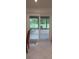 Dining Area featuring sliding glass doors leading to a patio and neutral tiled floors at 10928 Tangora St, Orlando, FL 32825