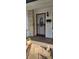 Inviting front door with decorative security gate and stone pillar accent at 10928 Tangora St, Orlando, FL 32825