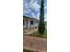 Pleasant single-story house with a brick walkway, stone accents, and well-kept landscaping at 10928 Tangora St, Orlando, FL 32825