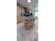 Kitchen island with storage and modern appliances in a spacious layout at 10928 Tangora St, Orlando, FL 32825