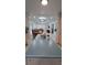 Modern kitchen with an island, bar seating, and an open layout at 10928 Tangora St, Orlando, FL 32825