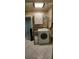 Laundry room featuring tile flooring, washer and dryer at 10928 Tangora St, Orlando, FL 32825