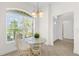 Cozy breakfast nook featuring a large window providing lots of natural light at 1254 Spartanburg Way, The Villages, FL 32162