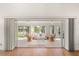 Bright sunroom featuring stylish furnishings and sliding glass doors that open to the outdoors at 1254 Spartanburg Way, The Villages, FL 32162